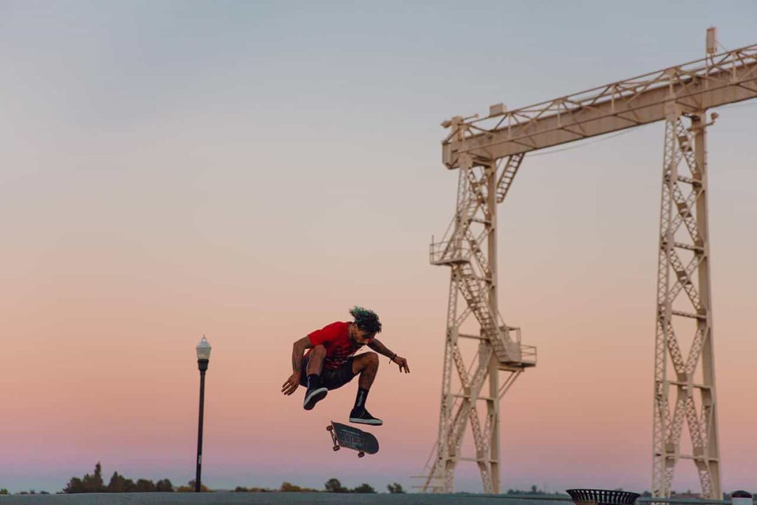 Skateboarder Manny Santiago doing a kickflip in San Francisco.