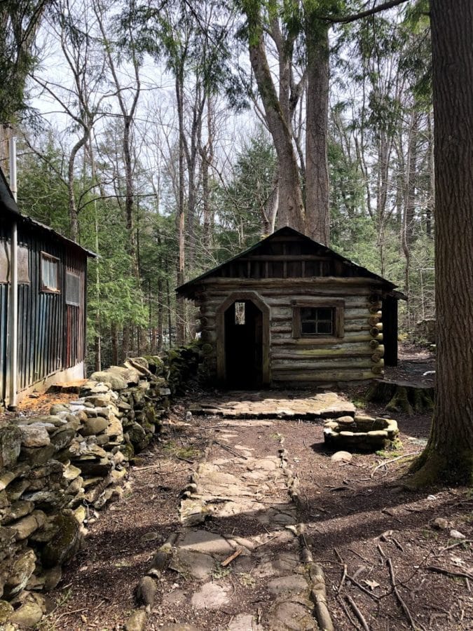 A cabin-style playhouse once referred to as "Adamless Eden in Daisy Town."