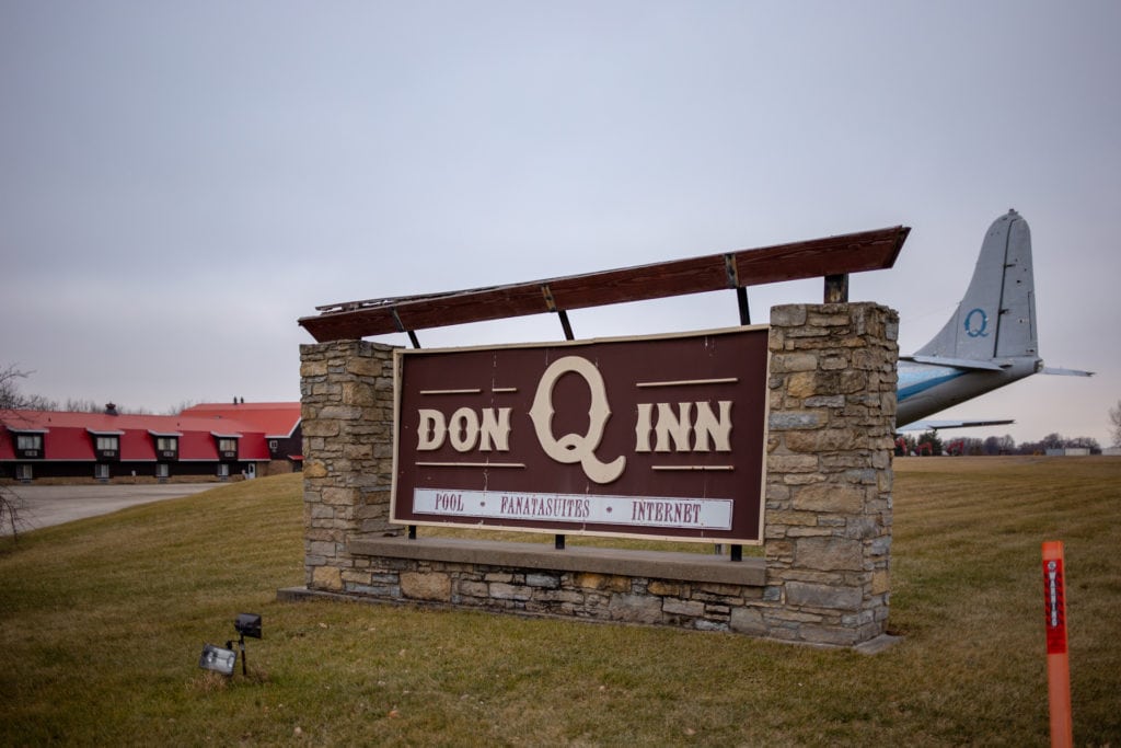 The sign of the Don Q Inn misspells Fantasuites