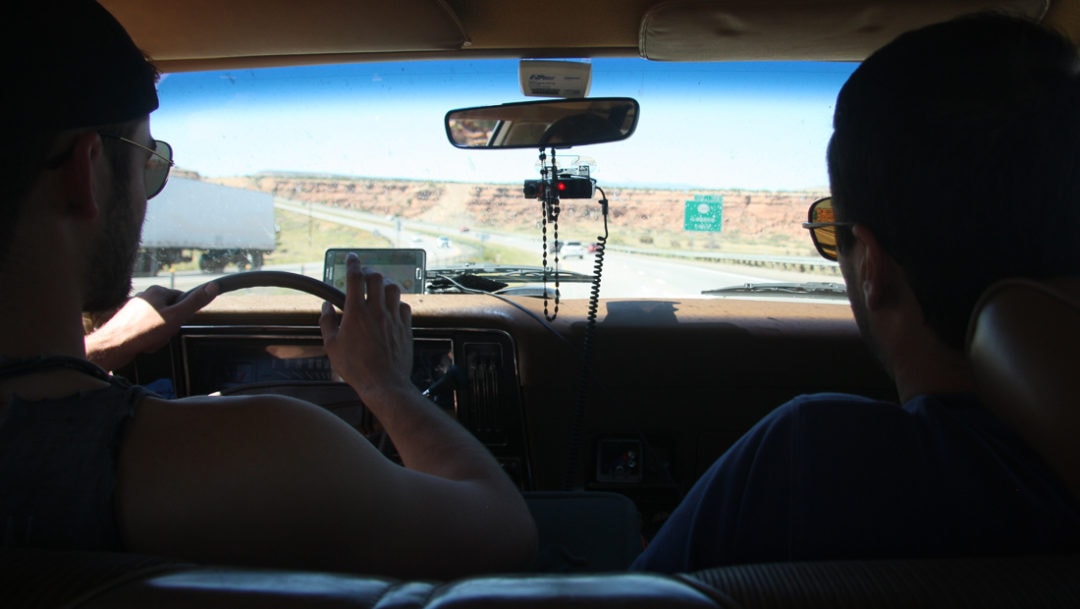 Mason Hart (left) and an anonymous federal bureaucrat blast across the Southwestern desert during the 2016 C2C Express. 