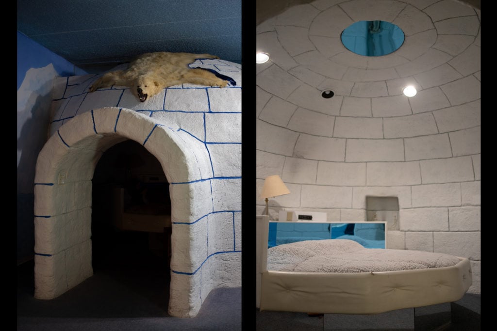 The bed for the Northern Lights room is located inside of the concrete igloo