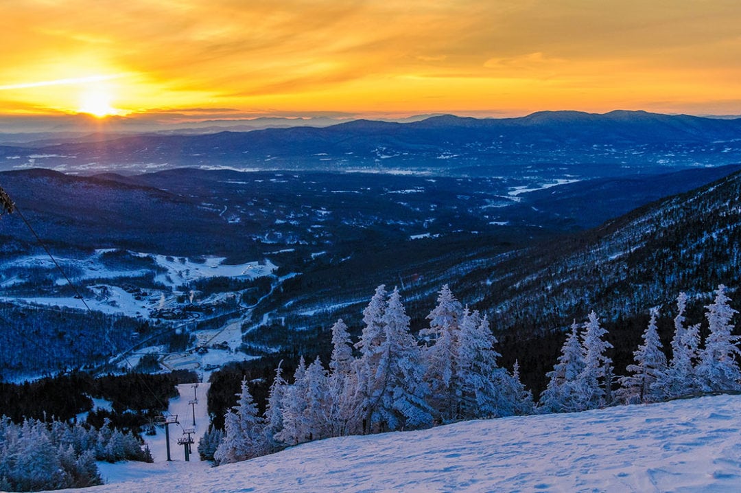 Sunset and snow view from Mt. Mansfield in Stowe, Vermont.
