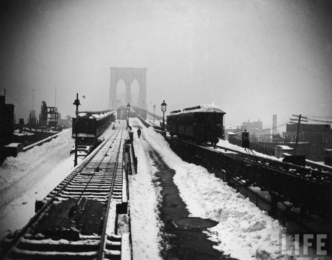 The Brooklyn Bridge and elevated trains during the blizzard of 1888.