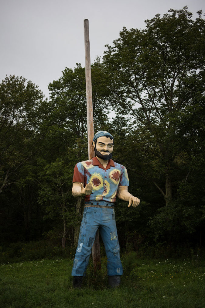 Before he was moved to the site of the Woodstock Festival in Bethel, NY this roadside fiberglass giant stood outside of a car repair shop in Albany, holding a muffler.