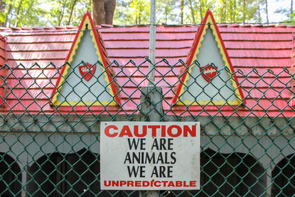 sign on animal cage