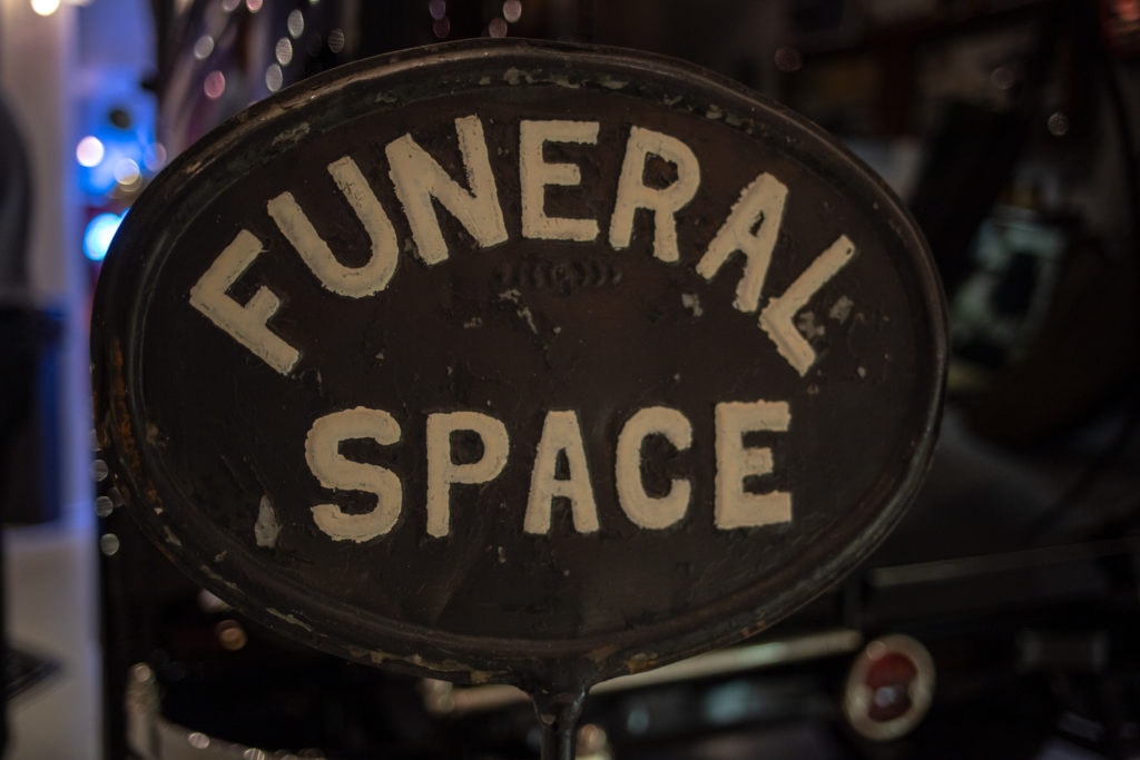 funeral parking sign