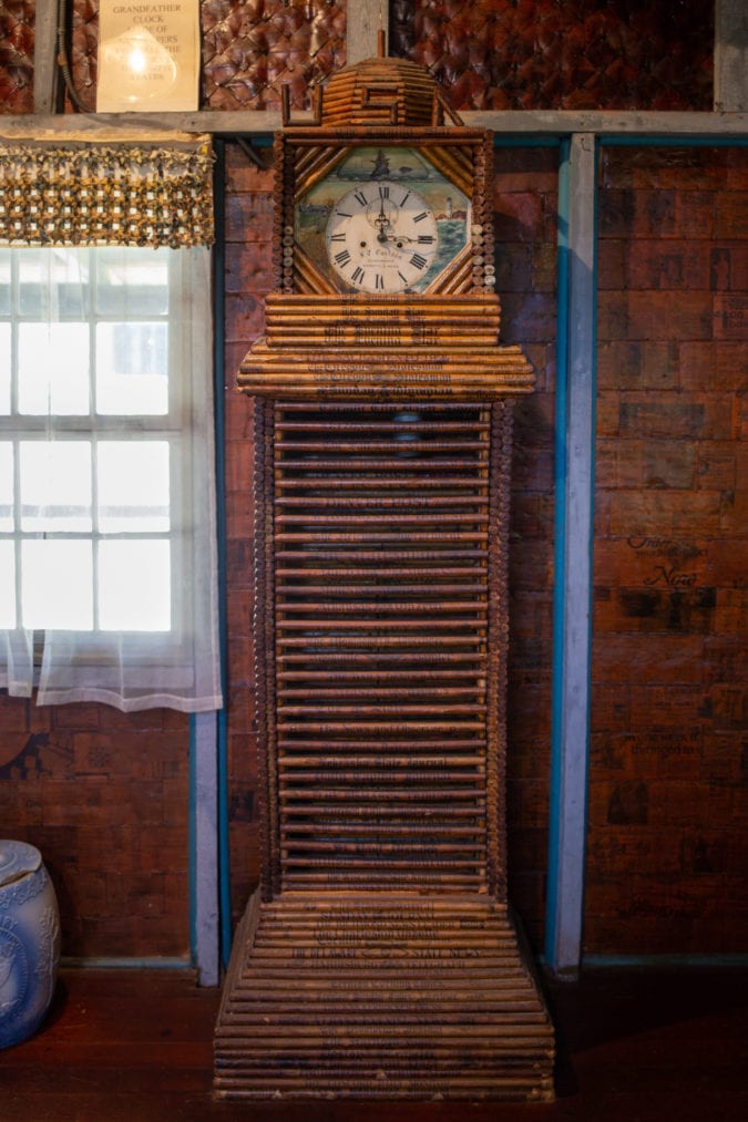A grandfather clock made of paper