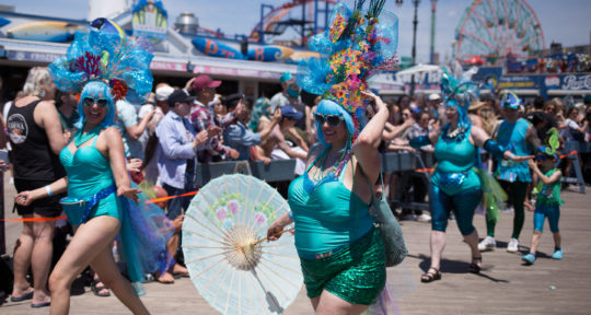 Coney Island’s Mermaid Parade kicks off summer with body glitter, sequin tails, and tongue-in-cheek activism