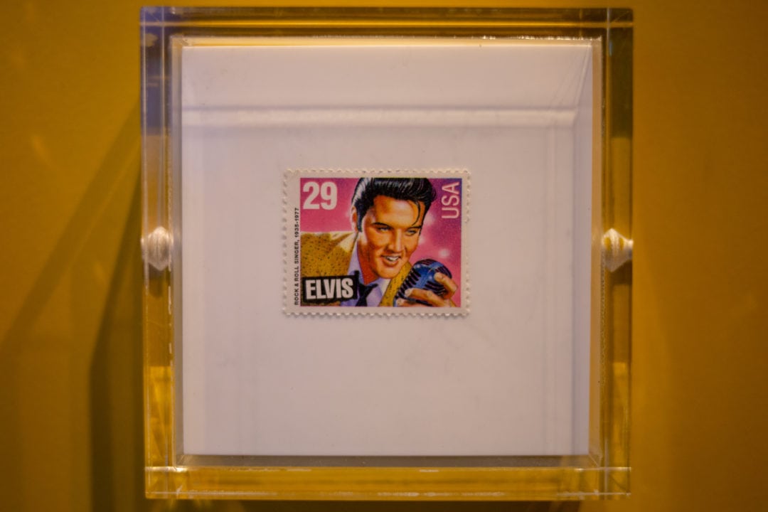 elvis stamp in a clear display case