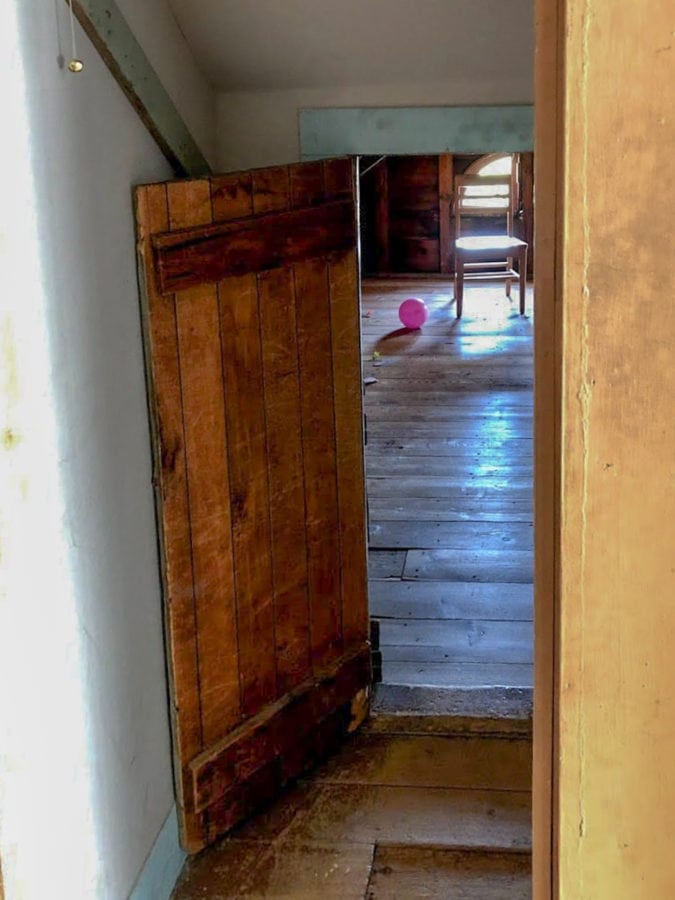 The door into the attic was tiny, and hidden in a closet. 