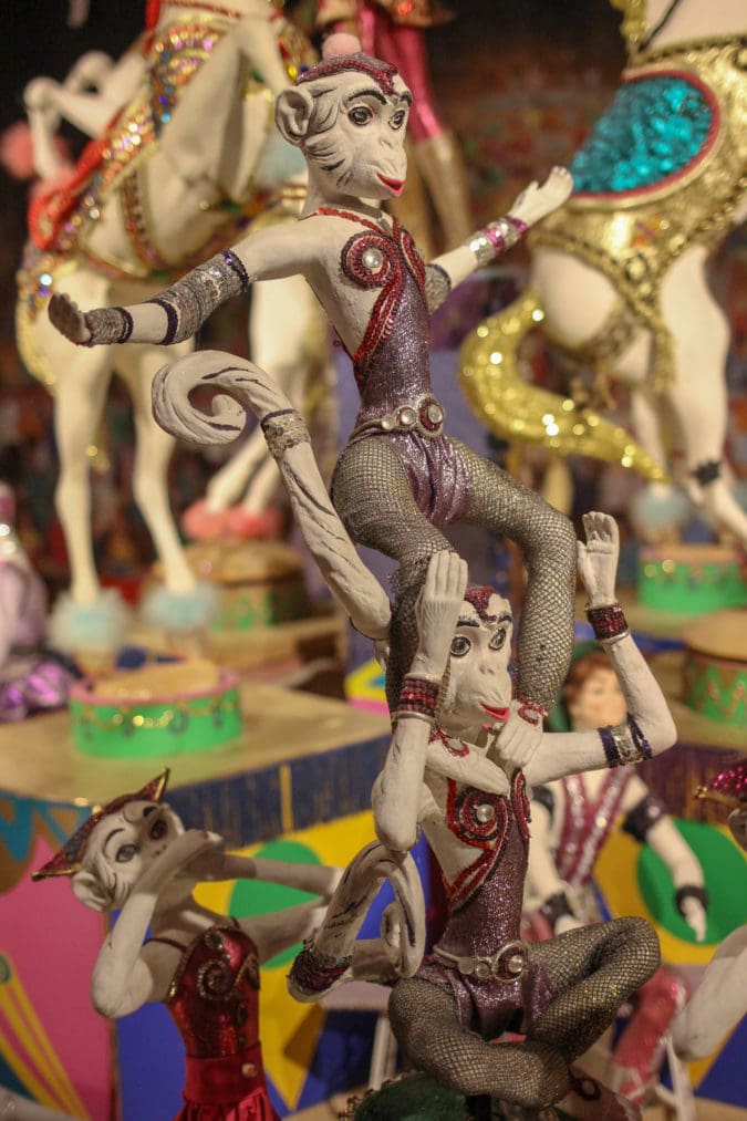 circus monkey statues in costume