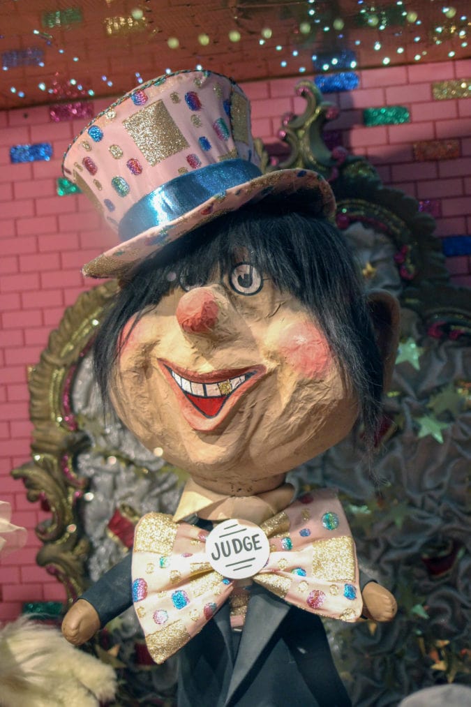 stuffed circus judge in a top hat