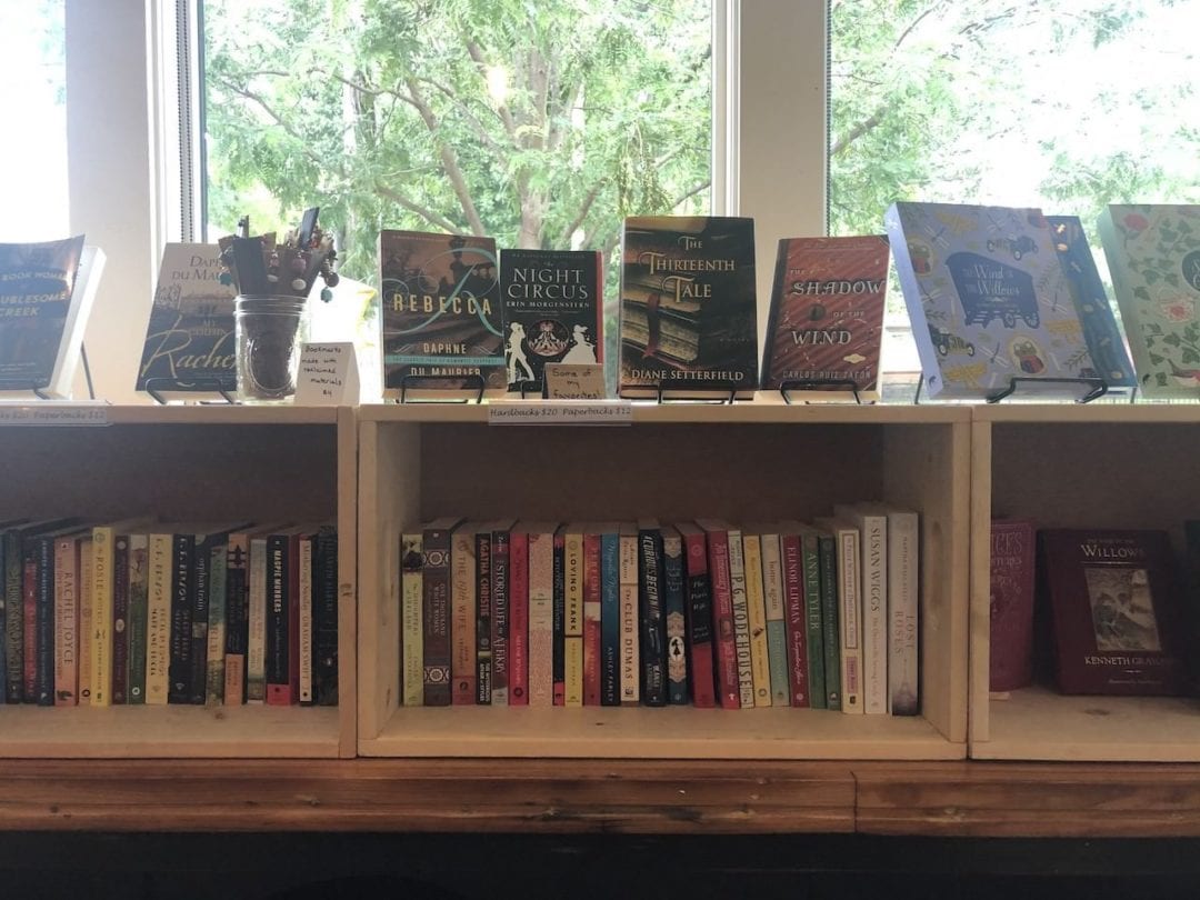 boxes of books form makeshift "shelves" in Wyoming Community Coffee