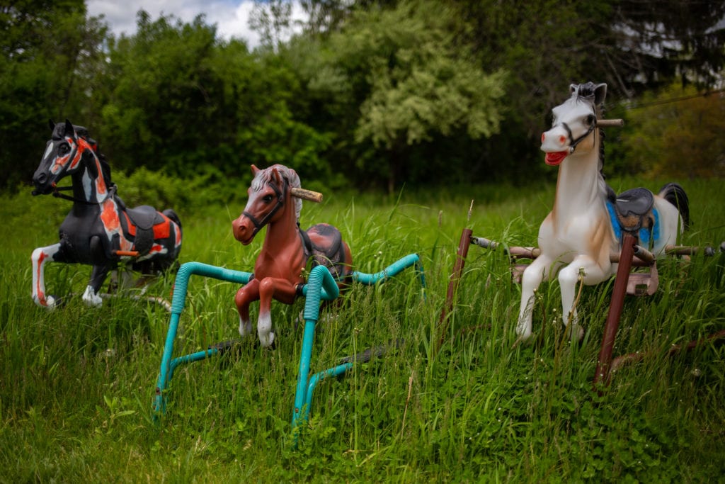 Behold Ponyhenge, a mysterious herd of rocking horses that inexplicably  multiplies and rearranges - Roadtrippers
