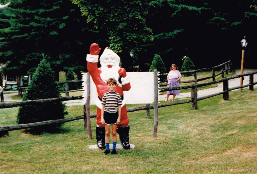 kid with fiberglass santa