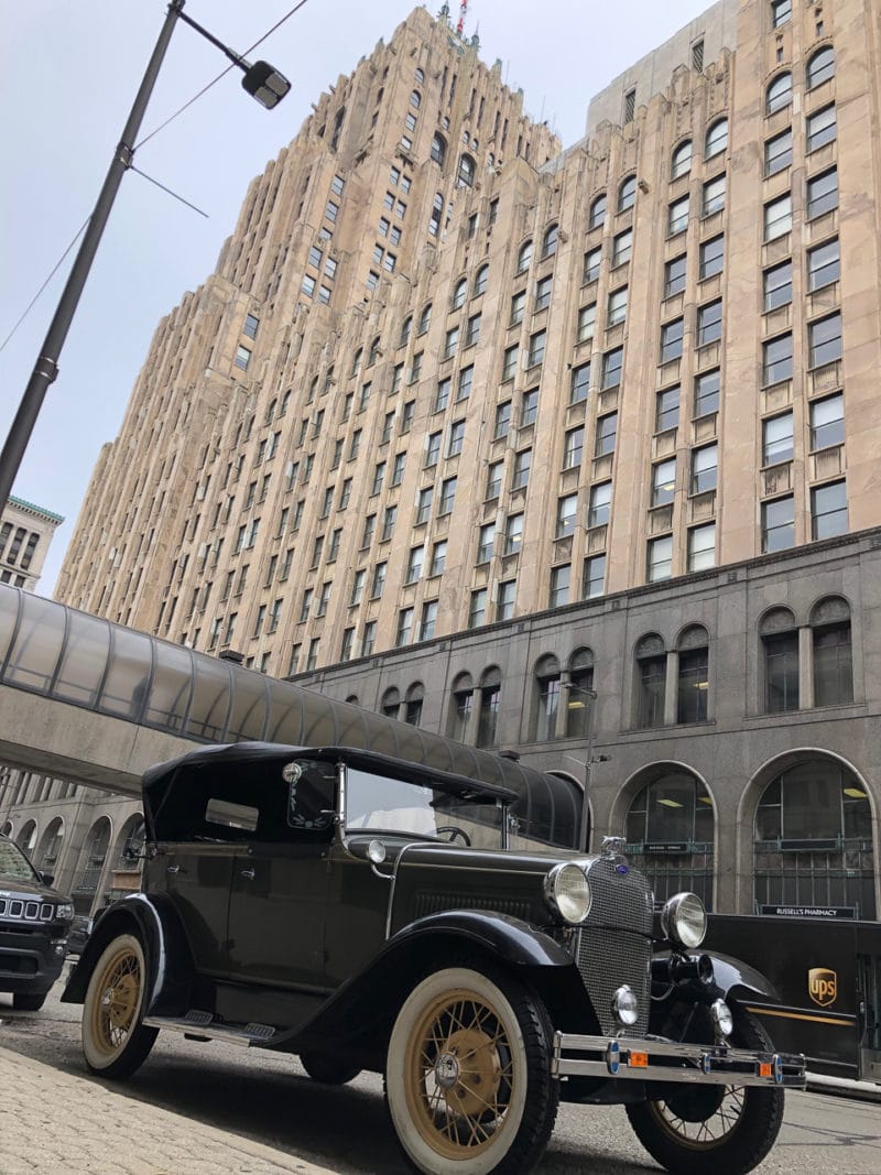 One of Antique Touring's Ford Model A vehicles, parked in downtown Detroit.