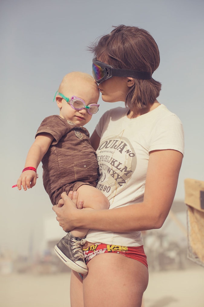 A mother and a child wearing goggles
