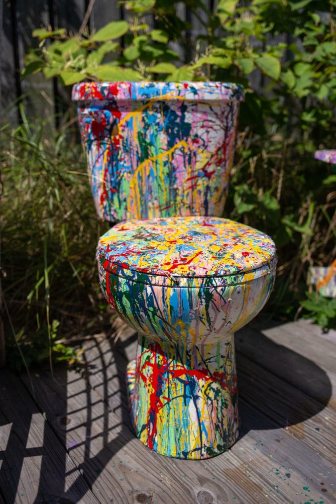 paint splattered toilet