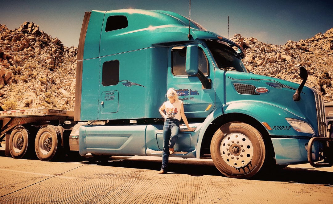 Brittany Burnett in front of a truck