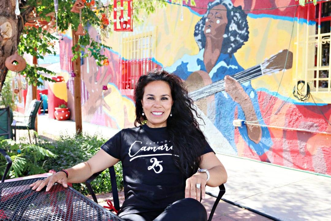 Valeria Montes sits in front of Casa Flamenca, an Albuquerque nonprofit for flamenco programming and performance. 