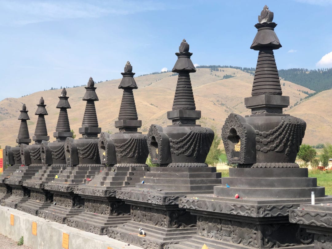 Great Stupas—pointed, dome-shaped monuments of Buddhism used to house sacred relics and represent the enlightened mind.