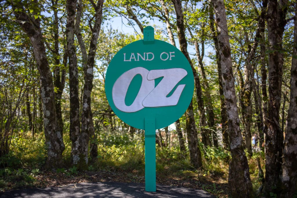 A sign welcomes visitors to Land of Oz.