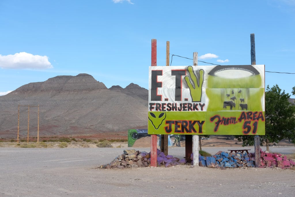 A sign advertises "fresh" E.T. jerky.