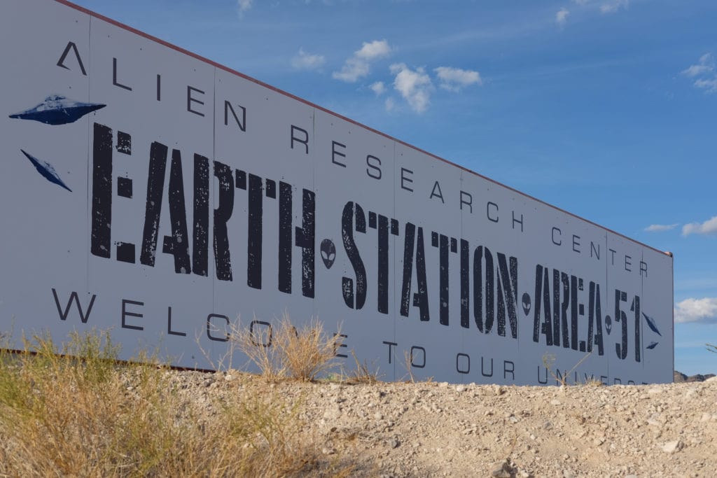A billboard for the Alien Research Center.