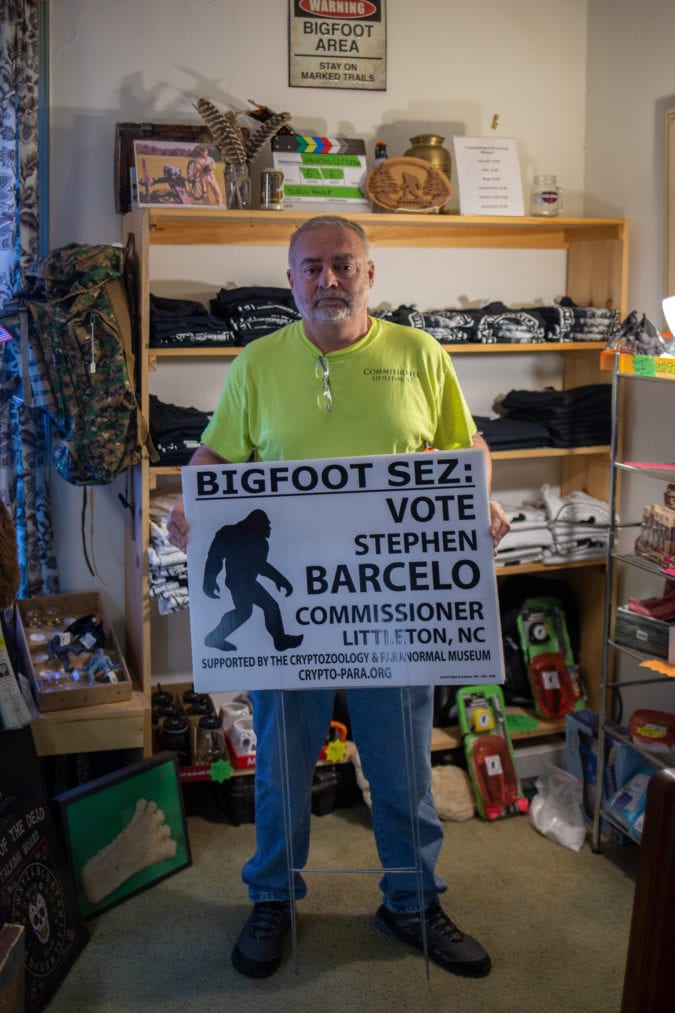 Stephen Barcelo with his yard sign.