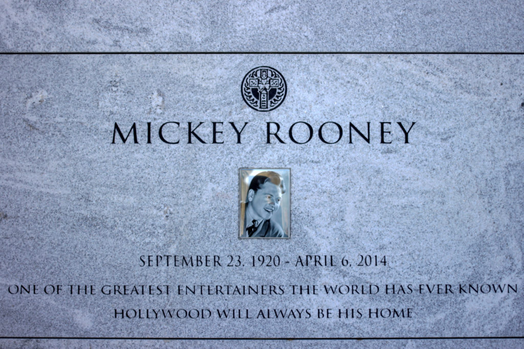 Garland's frequent costar Mickey Rooney is interred nearby.