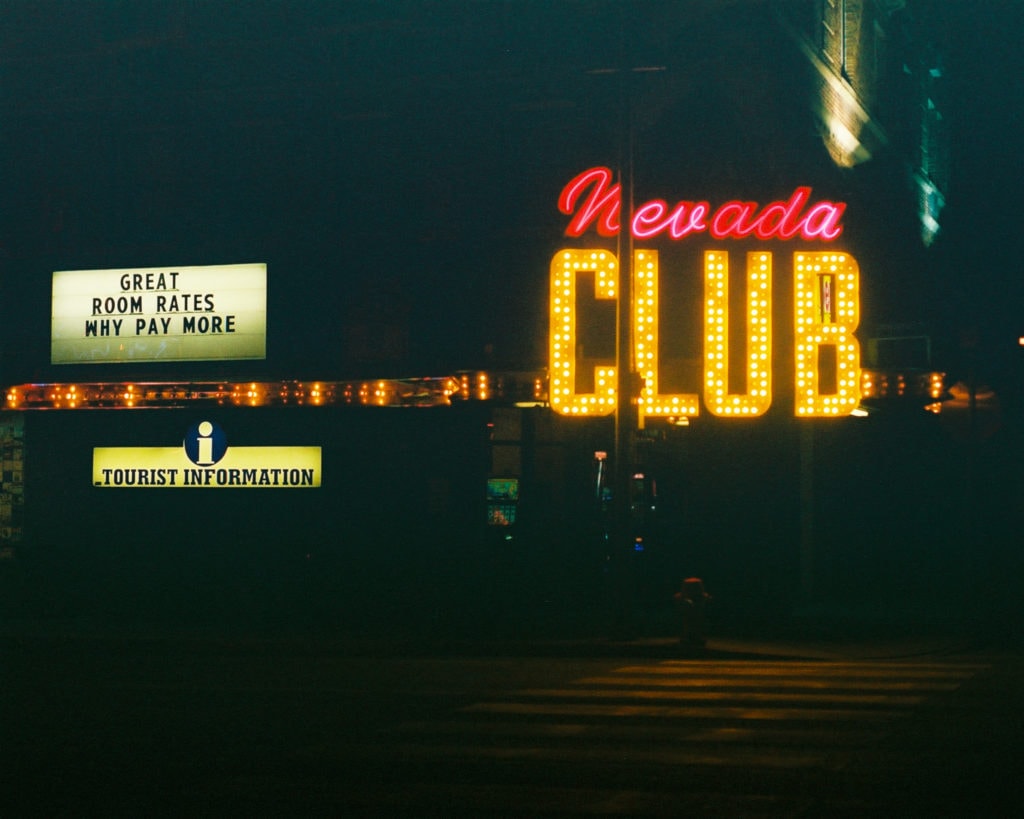 Ely, Nevada at night. Nevada Club Motel and Casino