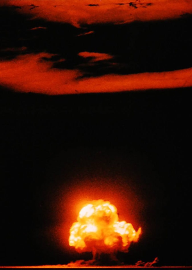 a color photograph of a mushroom cloud explosion
