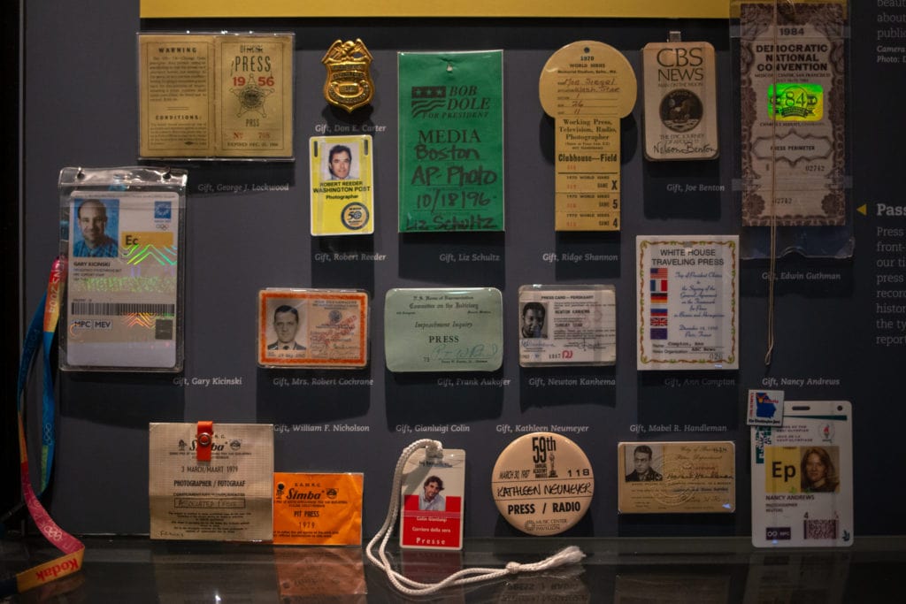 A collection of press passes.