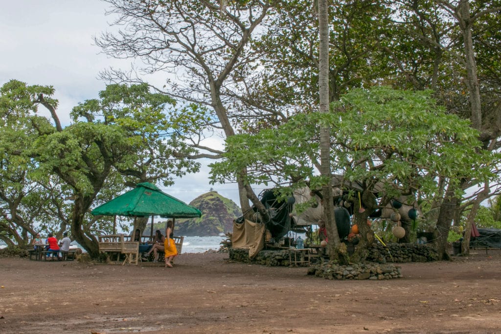 The seating area of Huli Huli Chicken is located just steps from Maui's Red Sand Beach, Kaihalulu.