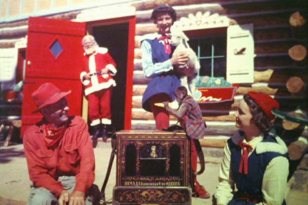 Rufus Porter, his hurdy gurdy and monkey and a few of Santa's gnomes.