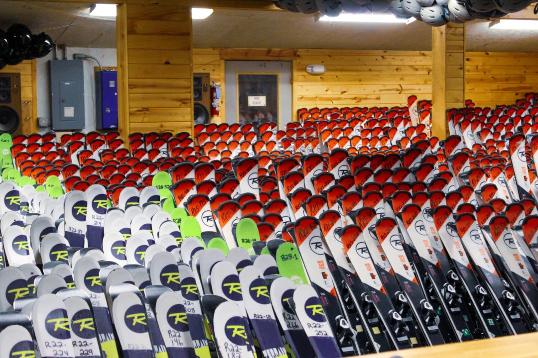 Rows and rows of skis at the Cascade Mountain rental shop