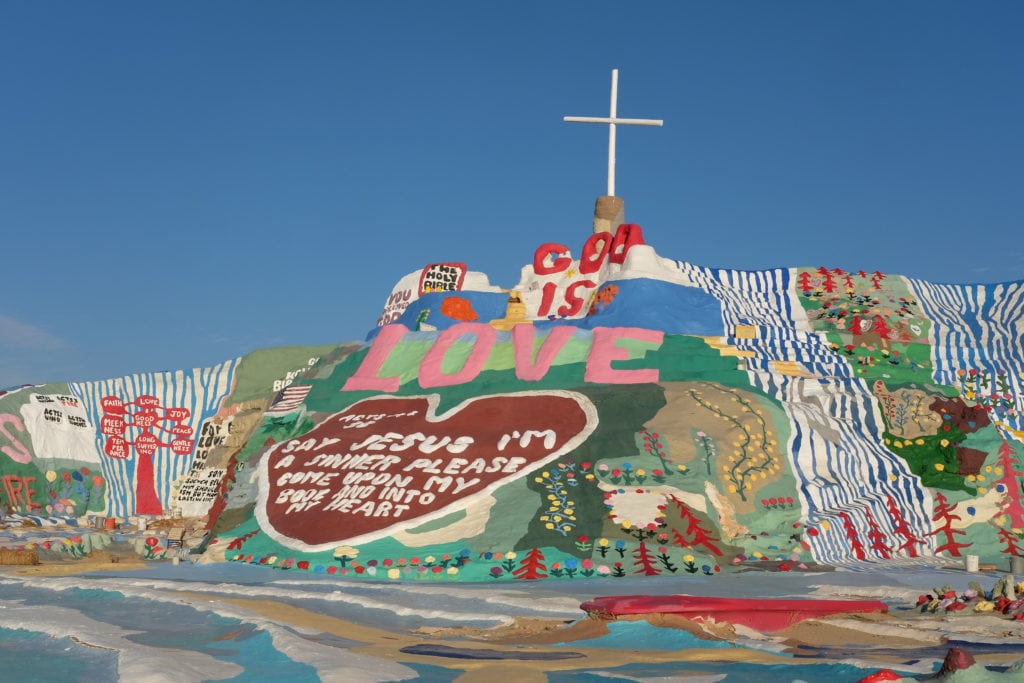 Salvation Mountain, a large art installation just outside of Slab City, brings in dozens of tourists a day.