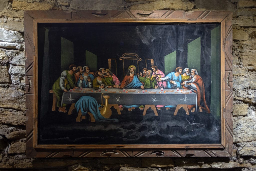 A velvet painting of the Last Supper.