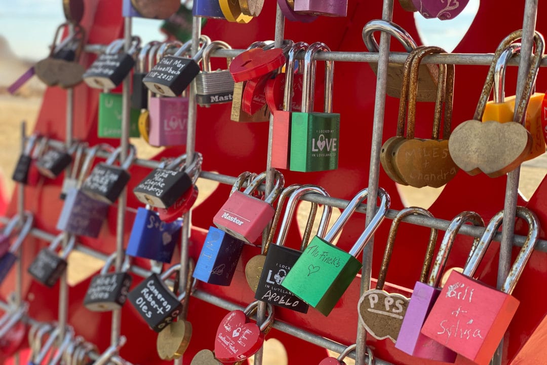People attach locks to statues in Loveland to show that their love is for eternity.