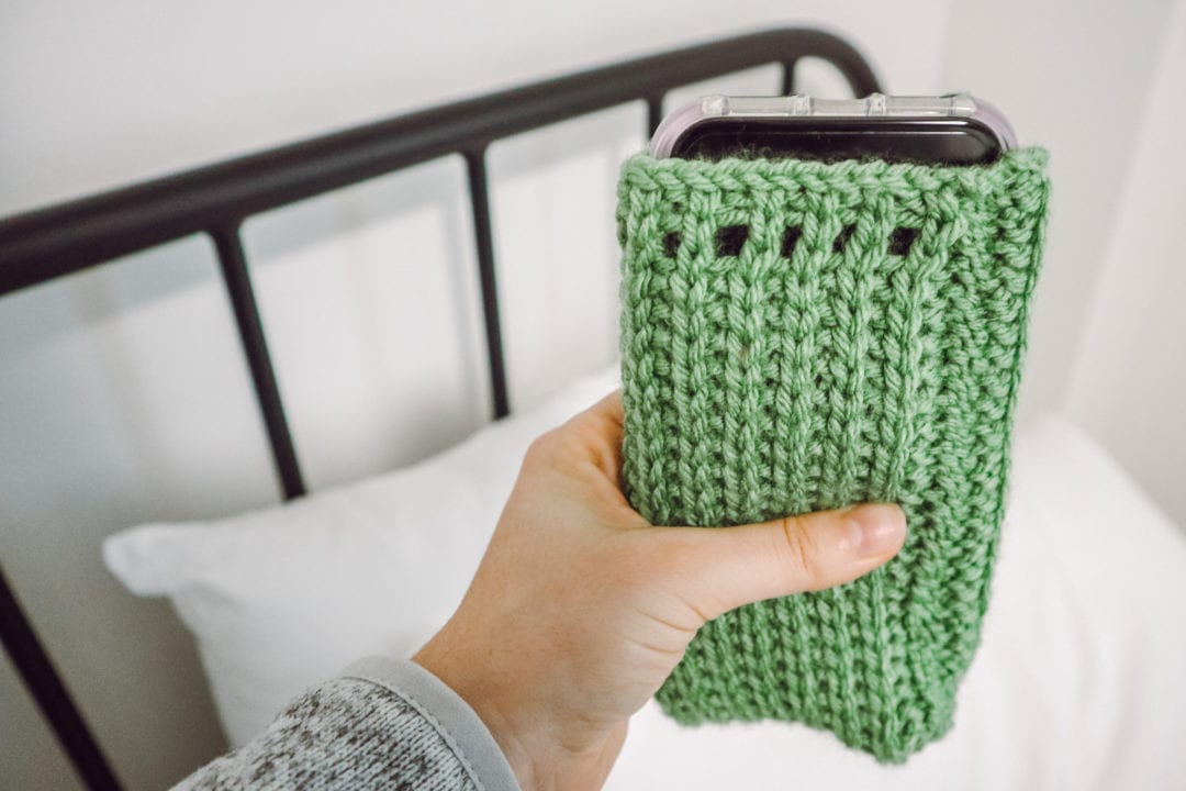 A knitted pocket for smartphones.