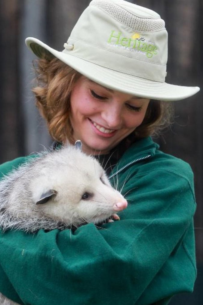 Rebekah Perry Franks and Perry Opossum teach the farm’s young visitors about what’s in their own backyards.