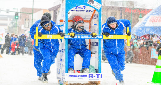 On a roll: At Alaska’s annual Outhouse Races, there’s no shame in being number two