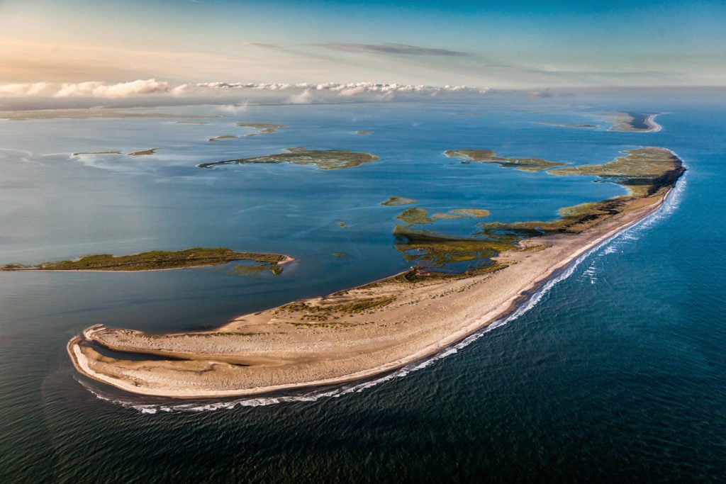 An overview of Cobb Island with Hog Island in the background.
