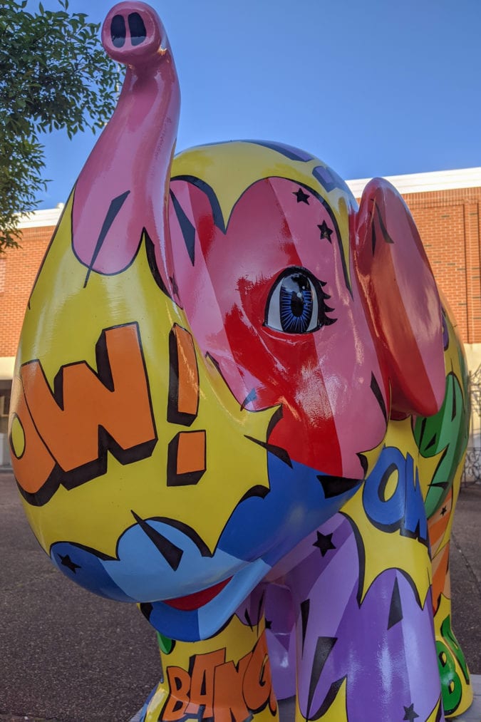 An elephant painted with bright exclamations on Main Street in Erwin.