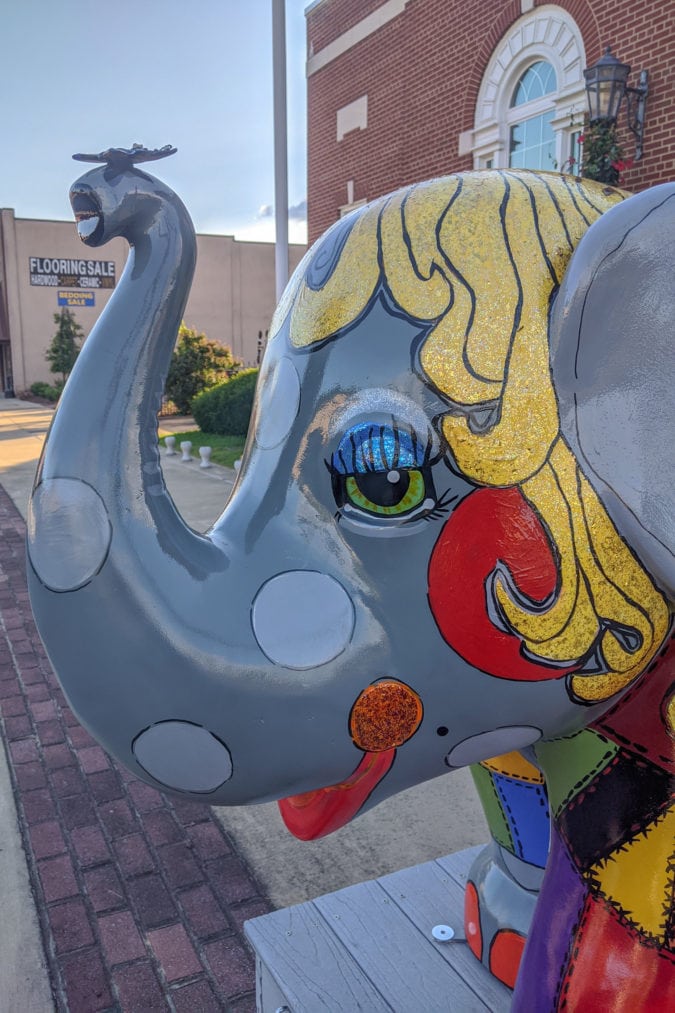 Doll-E, a fancy elephant in front of the town's old post office.