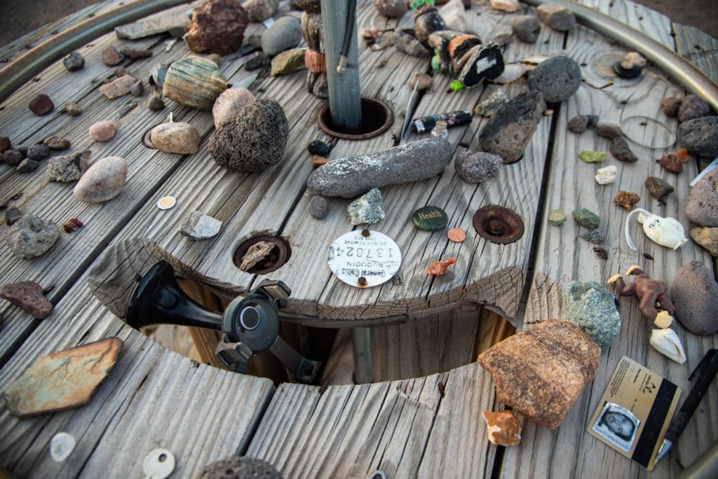 Rocks and personal items left behind in the “Healing Garden” which according to Messoline, possesses strong powers.