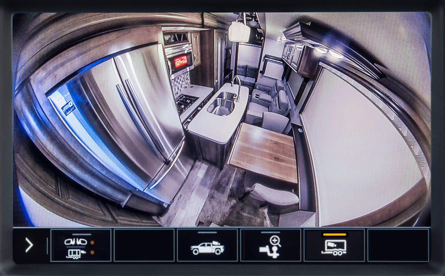 View of camera in pickup truck of attached travel trailer interior