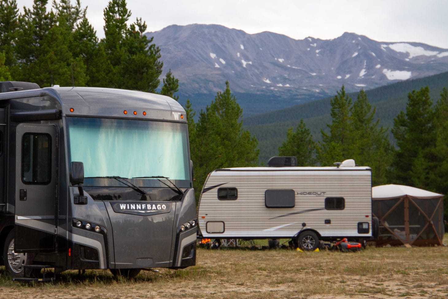 Motorhome and trailer parked for boondocking