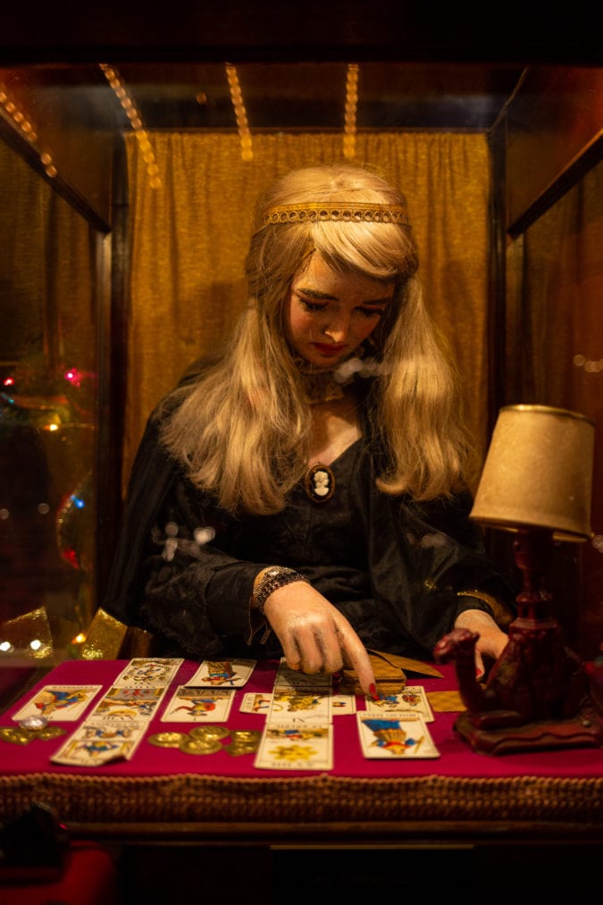 A coin operated fortune teller.