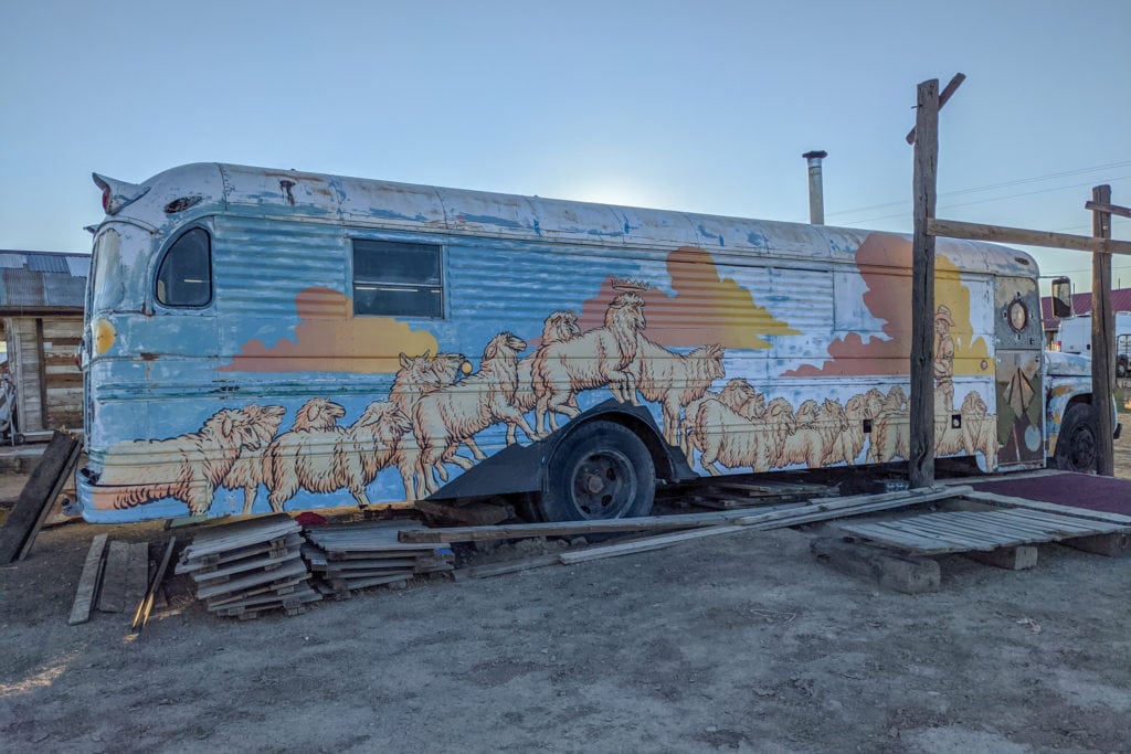 A mural on one of the old buses Muza found on the site.